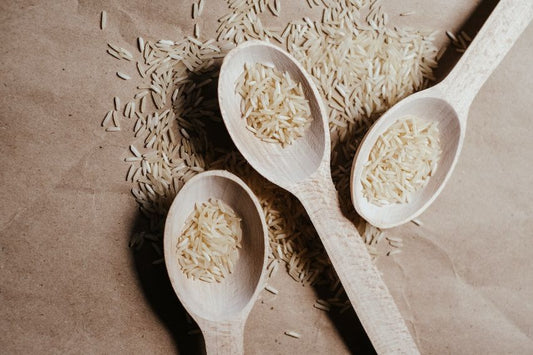 spoons of uncooked rice